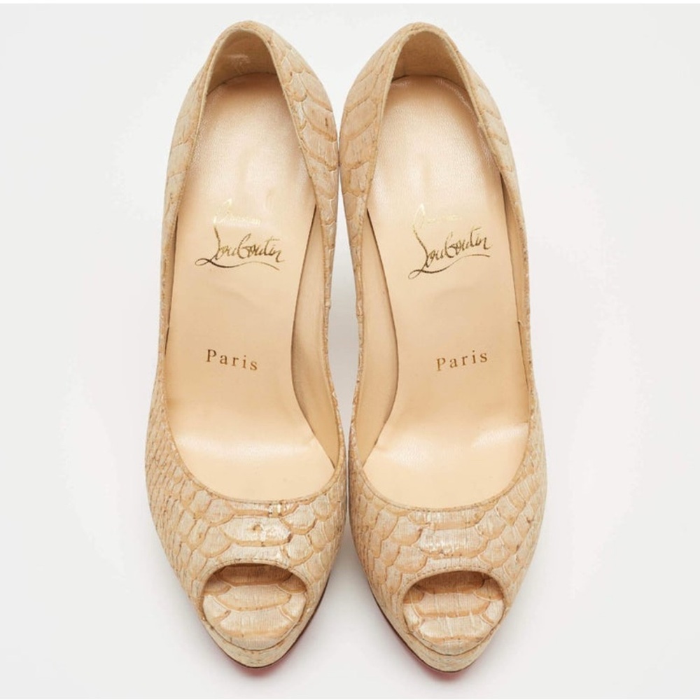 Christian Louboutin Cream Heels with Sophisticated Design